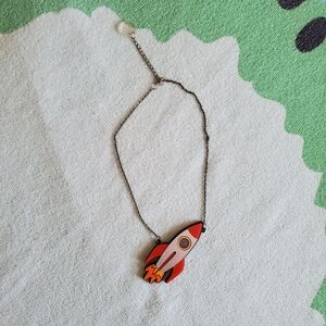 Skully Bunting Acrylic Rocketship Necklace